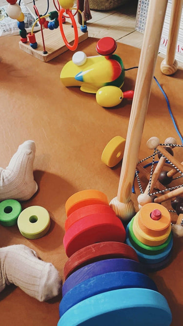 Skwish Rattle in Dark Brown from Manhattan Toy Company